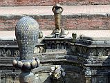 Kathmandu Bhaktapur 05-3 Bhaktapur Durbar Square Naga Pokhari Cobra Heads Close Up Naga cobra heads face each other in the Naga Pokhari in the Palace of 55 Windows in Bhaktapur�s Durbar Square.